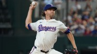 Texas Rangers pitcher Jacob deGrom (48) throws to the plate during the first inning against the Philadelphia Phillies at Globe Life Field. Mandatory Credit: Raymond Carlin III-Imagn Images