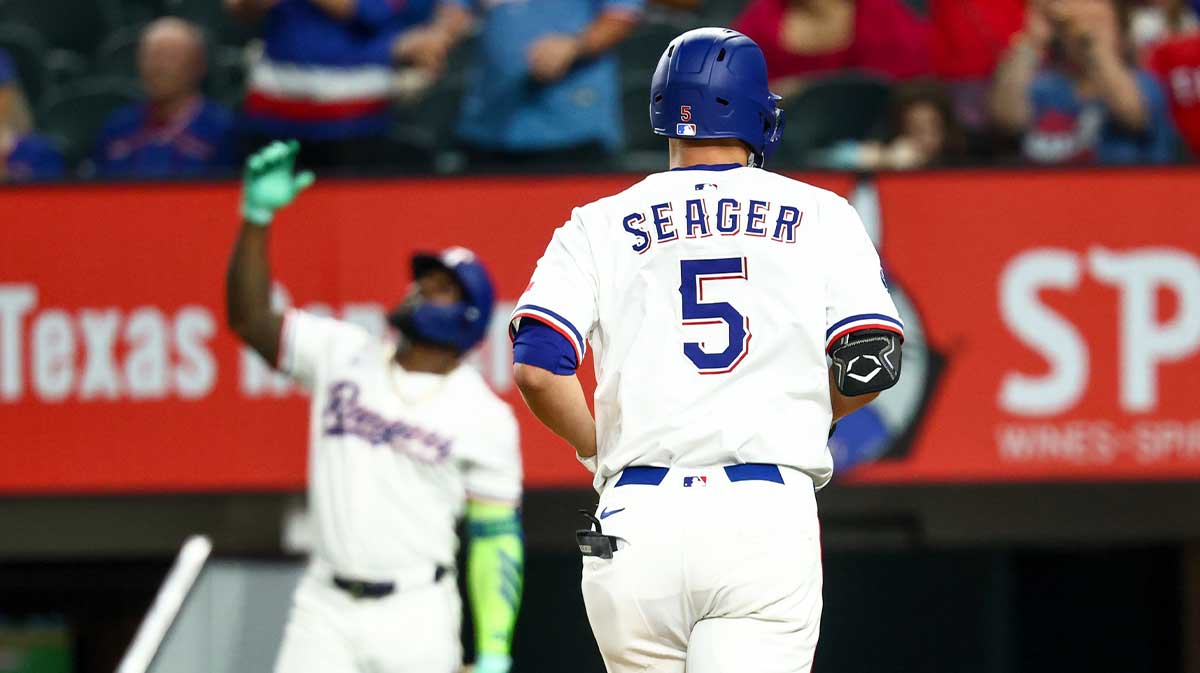 Texas Rangers shortstop Corey Seager (5) rounds the bases after hitting a home run during the seventh inning against the Los Angeles Angels at Globe Life Field.