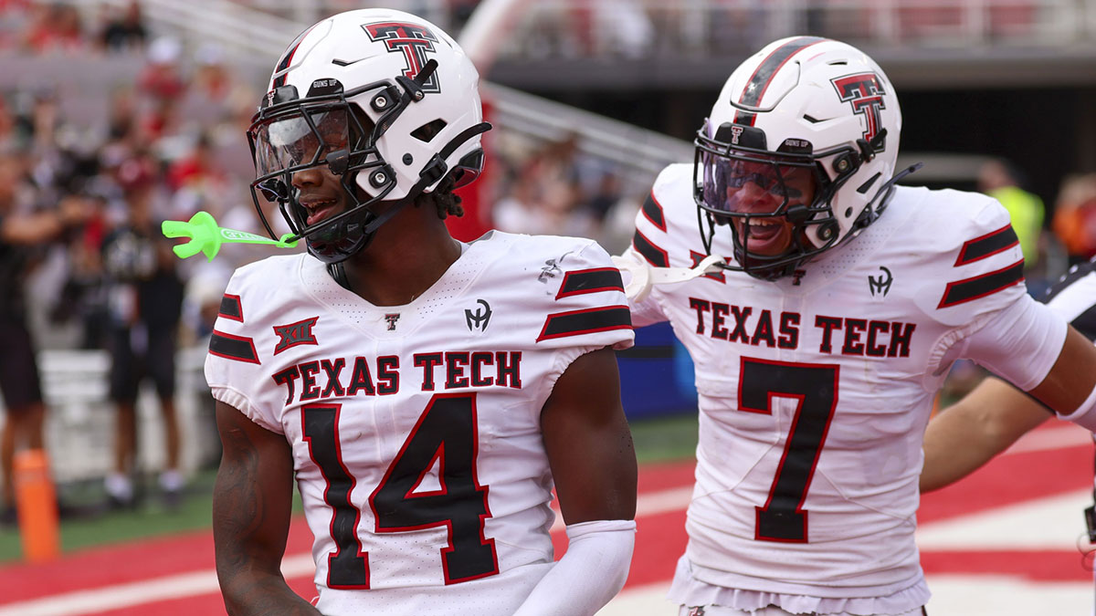 Texas Tech Red Raiders defensive back Brice Pollock (14) and defensive back Brenden Jordan (7) react to a defensive stop against the Utah Utes during the third quarter at Rice-Eccles Stadium.