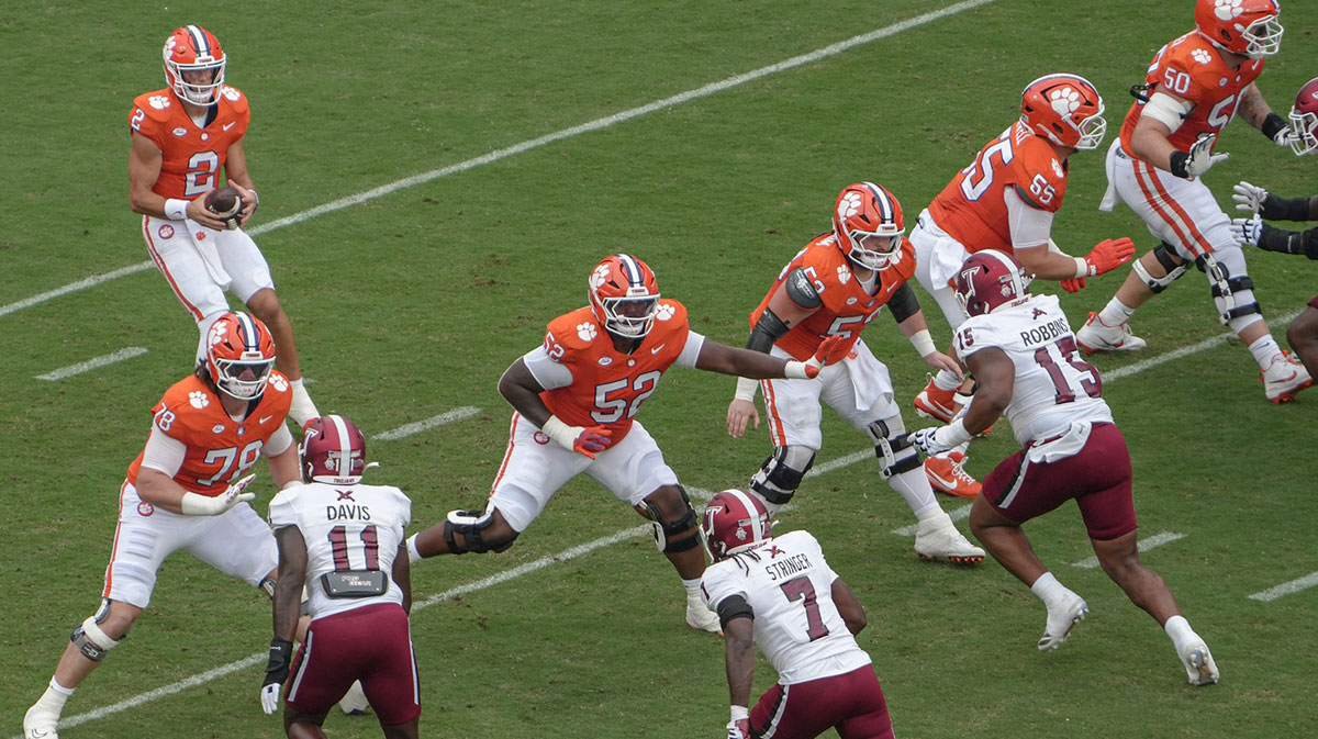 Clemson quarterback Cade Klubnik (2) fades back to pass behind offensive linemen, from left, Blake Miller (78), offensive lineman Elijah Thurmon (52), Ryan Linthicum (53), Harris Sewell (55) and Collin Sadler (50) playing Troy during the first quarter at Memorial Stadium in Clemson, S.C. Saturday, September 6, 2025.