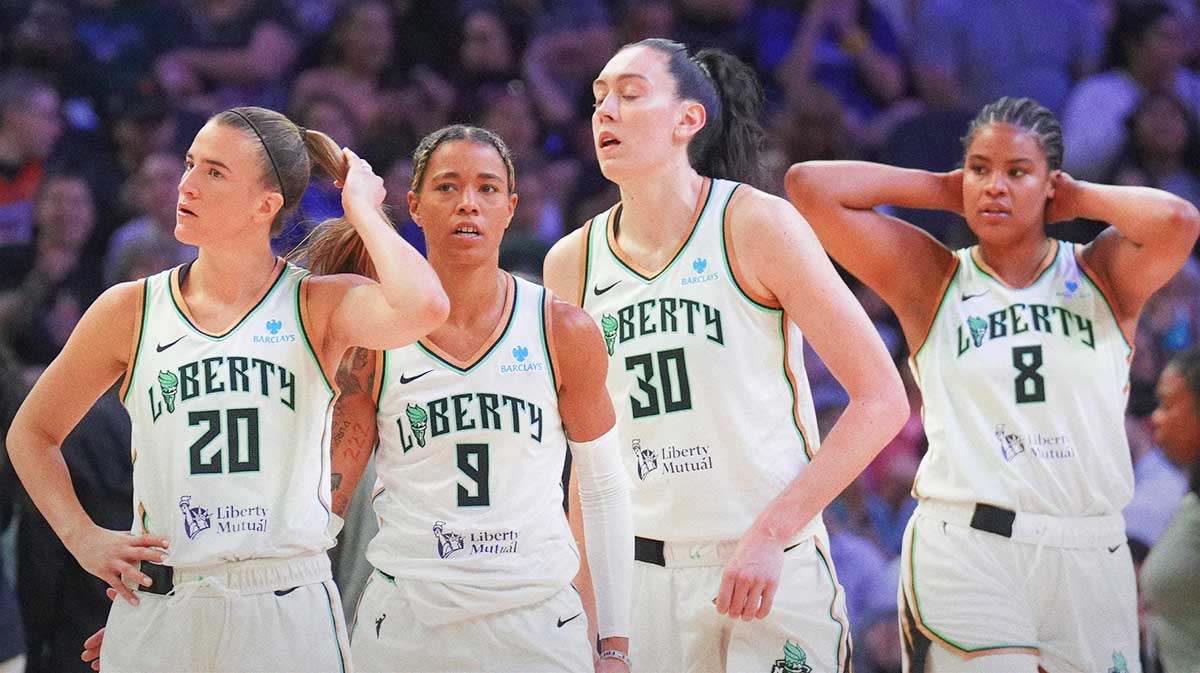 New York Liberty guard Sabrina Ionescu (20) and New York Liberty guard Natasha Cloud (9) and New York Liberty forward Breanna Stewart (30) and New York Liberty center Nyara Sabally (8) look on against the Phoenix Mercury during the second half at Footprint Center.