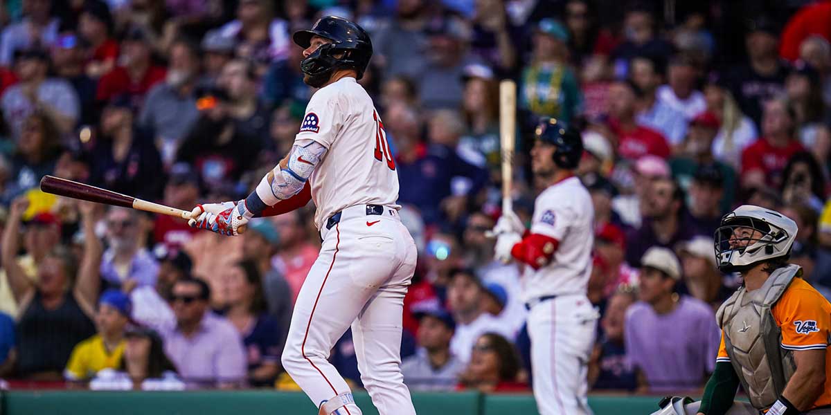 Boston Red Sox shortstop Trevor Story (10) hits a home run against the Athletics in the eighth inning at Fenway Park. 