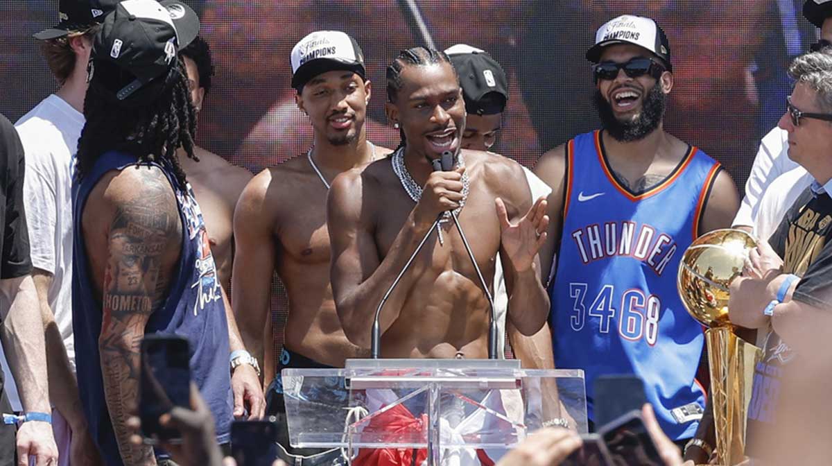 Thunder guard Shai Gilgeous-Alexander speaks to fans during the Oklahoma City Thunder Champions parade