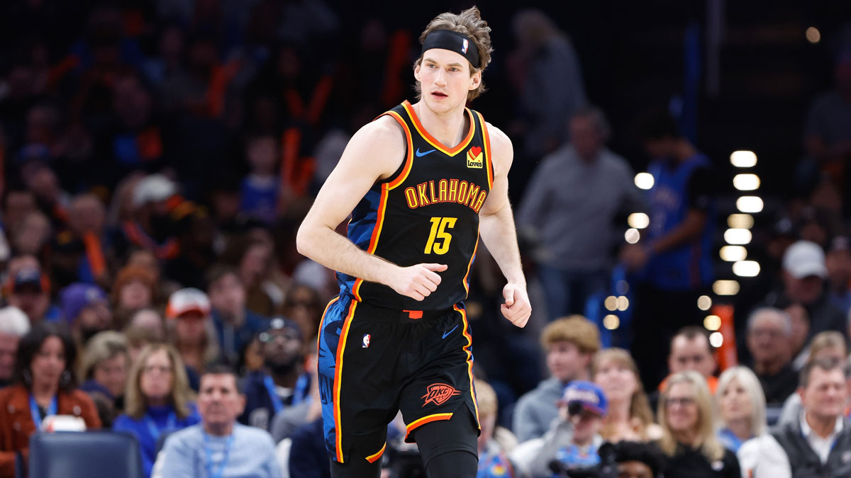 Thunder center Branden Carlson (15) runs down the court against the Brooklyn Nets during the second half at Paycom Center