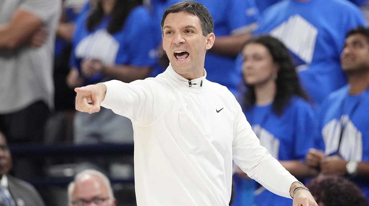 Thunder head coach Mark Daigneault directs players against the Indiana Pacers during the second half of game seven of the 2025 NBA Finals at Paycom Center with NBA analyst Charles Barkley in the background