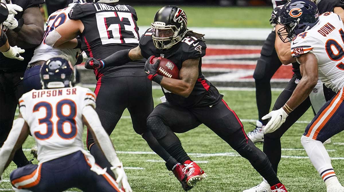 Atlanta Falcons running back Todd Gurley II (21) runs against the Chicago Bears during the second quarter at Mercedes-Benz Stadium.