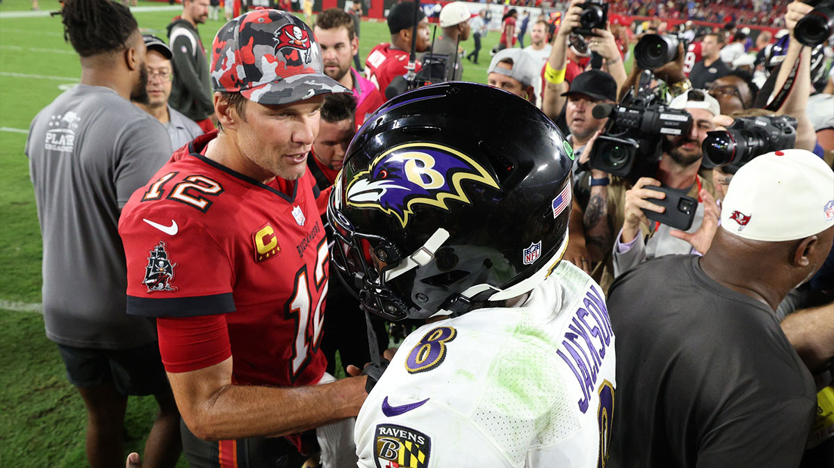 Oct 27, 2022; Tampa, Florida, USA; Tampa Bay Buccaneers quarterback Tom Brady (12) greets Baltimore Ravens quarterback Lamar Jackson (8) after a game at Raymond James Stadium. Mandatory Credit: Nathan Ray Seebeck-Imagn Images