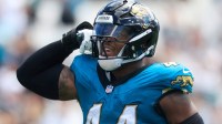 Jacksonville Jaguars defensive end Travon Walker (44) flexes after a sack on Houston Texans quarterback CJ. Stroud (7) during the first quarter of an NFL football matchup at EverBank Stadium in Jacksonville, Fla.