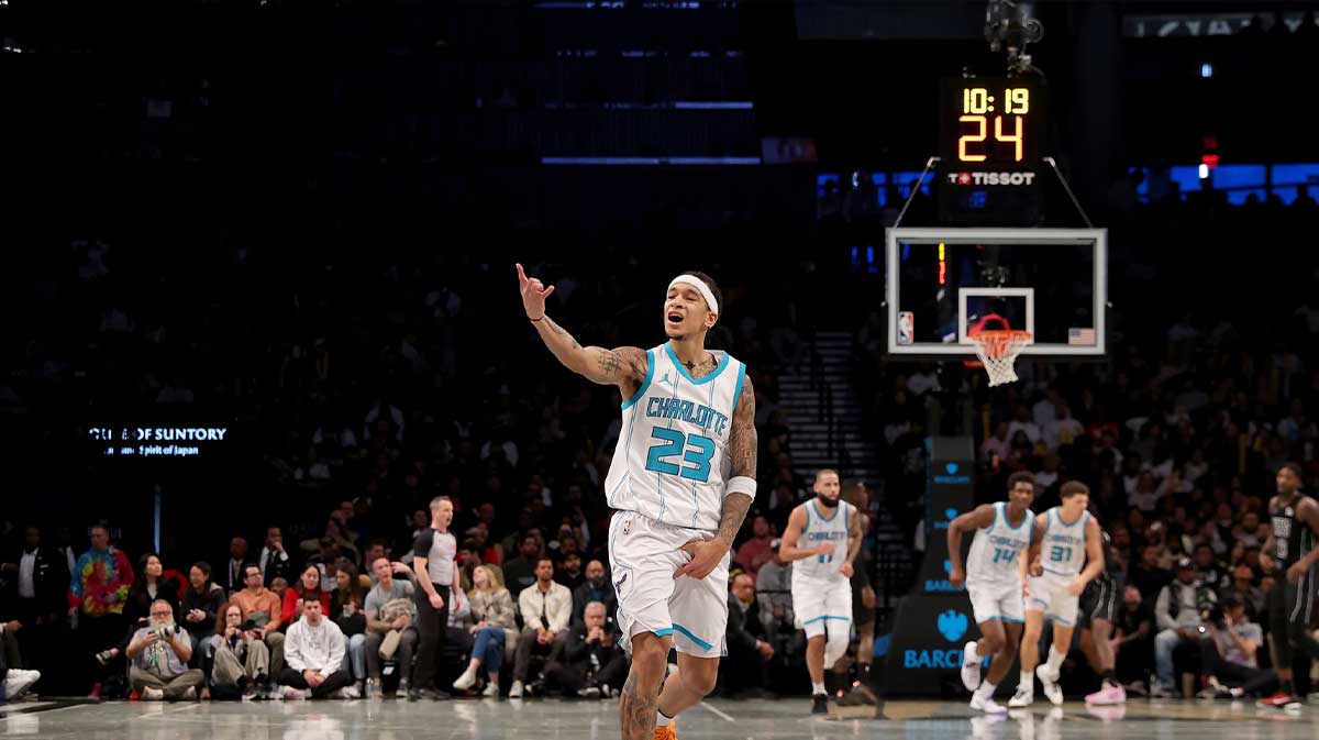 Charlotte Hornets guard Tre Mann (23) celebrates his three point shot against the Brooklyn Nets during the fourth quarter at Barclays Center.