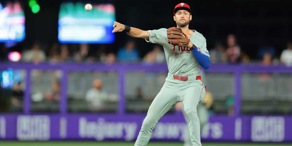 Philadelphia Phillies shortstop Trea Turner (7) throws to first base but cannot retire Miami Marlins second baseman Otto Lopez (not pictured) during the first inning at loanDepot Park.