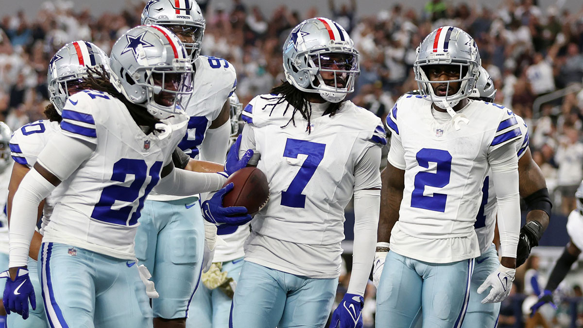 Dallas Cowboys cornerback Trevon Diggs (7) and his teammates react after an interception in the second quarter against the Philadelphia Eagles at AT&T Stadium. 