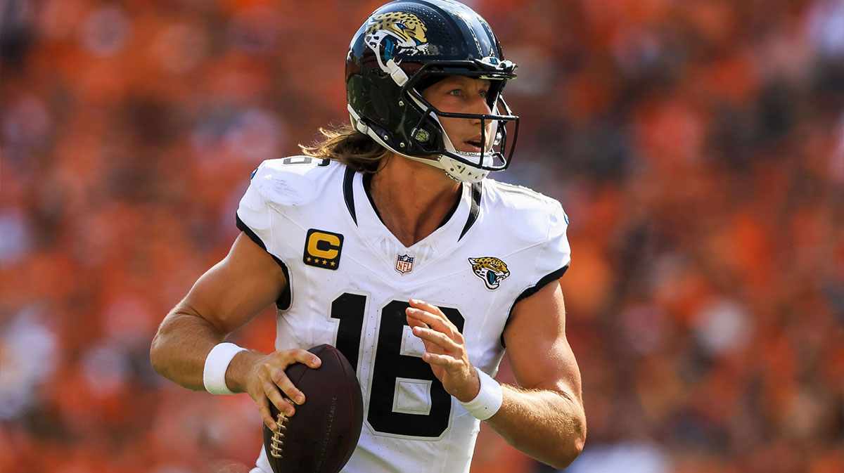 Jacksonville Jaguars quarterback Trevor Lawrence (16) runs with the ball against the Cincinnati Bengals in the second half at Paycor Stadium.