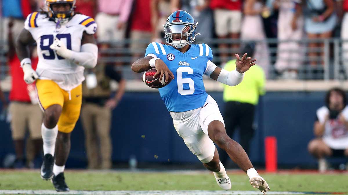 Mississippi Rebels quarterback Trinidad Chambliss (6) runs the ball during the fourth quarter against the LSU Tigers at Vaught-Hemingway Stadium.