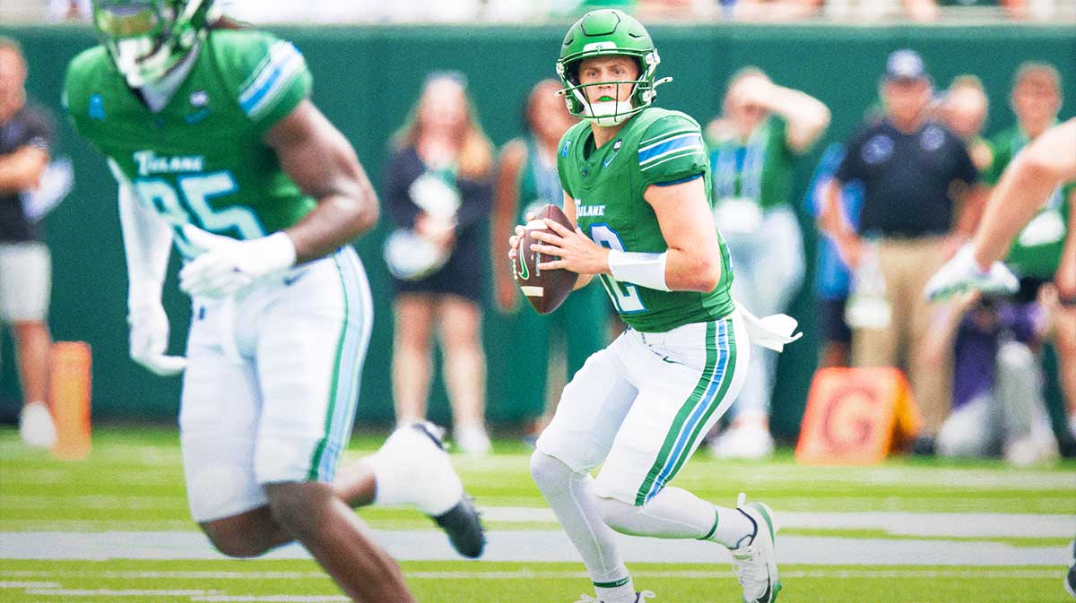 Tulane Green Wave quarterback Jake Retzlaff (12) looks to pass against Northwestern Wildcats during the first half at Yulman Stadium.