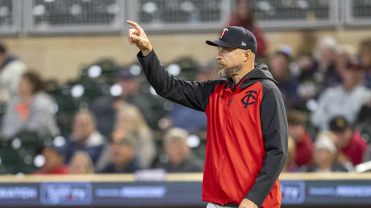 Minnesota Twins manager Rocco Baldelli (5) walks out of the dugout to make a pitching change against the Chicago White Sox in the ninth inning at Target Field.