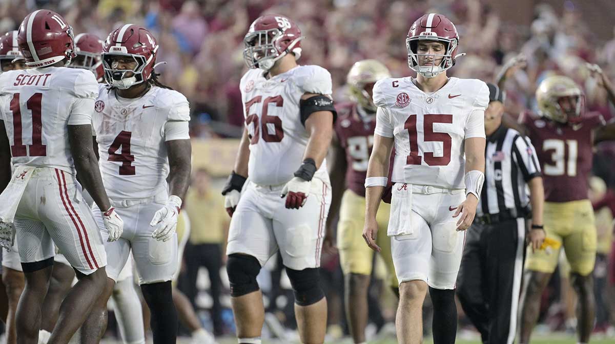 Alabama Crimson Tide quarterback Ty Simpson (15) reacts after a play against the Florida State Seminoles during the second half at Doak S. Campbell Stadium.