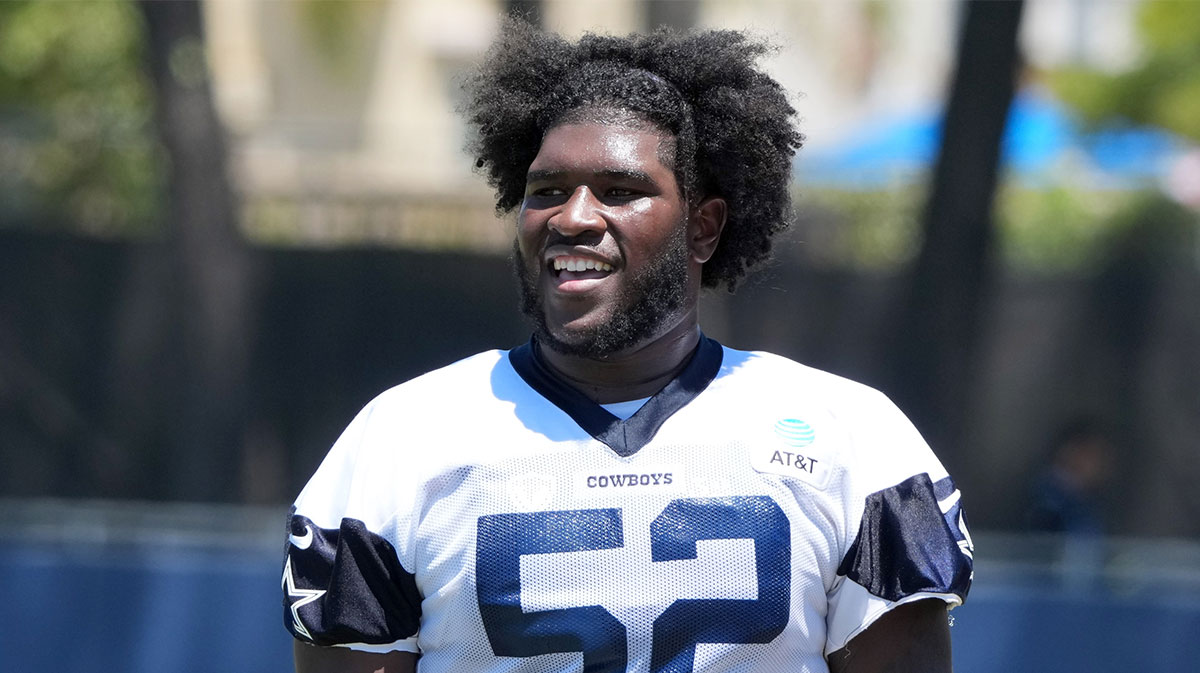 Dallas Cowboys guard Tyler Booker (52) at training camp at the River Ridge Fields.