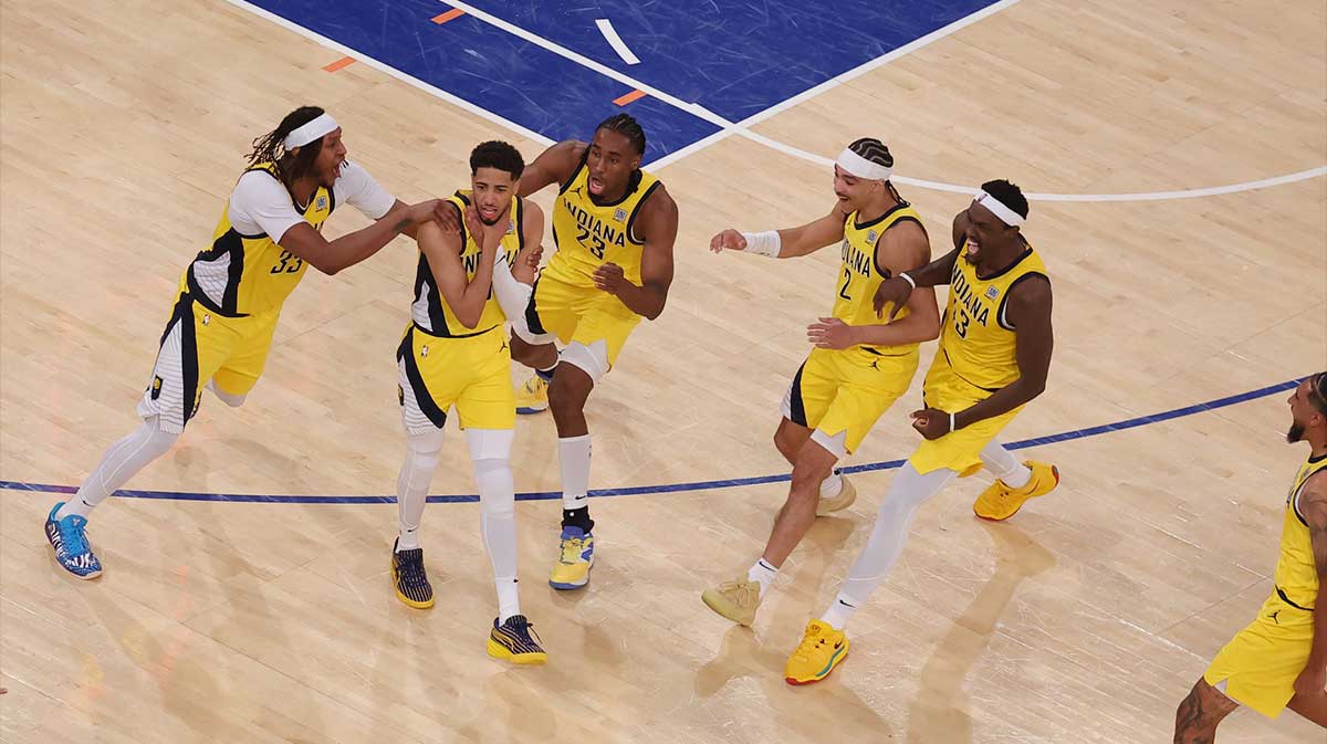 Indiana Pacers guard Tyrese Haliburton (0) celebrates with teammates after tying the game in the fourth quarter to send the game to overtime against the New York Knicks during game one of the eastern conference finals for the 2025 NBA Playoffs at Madison Square Garden.