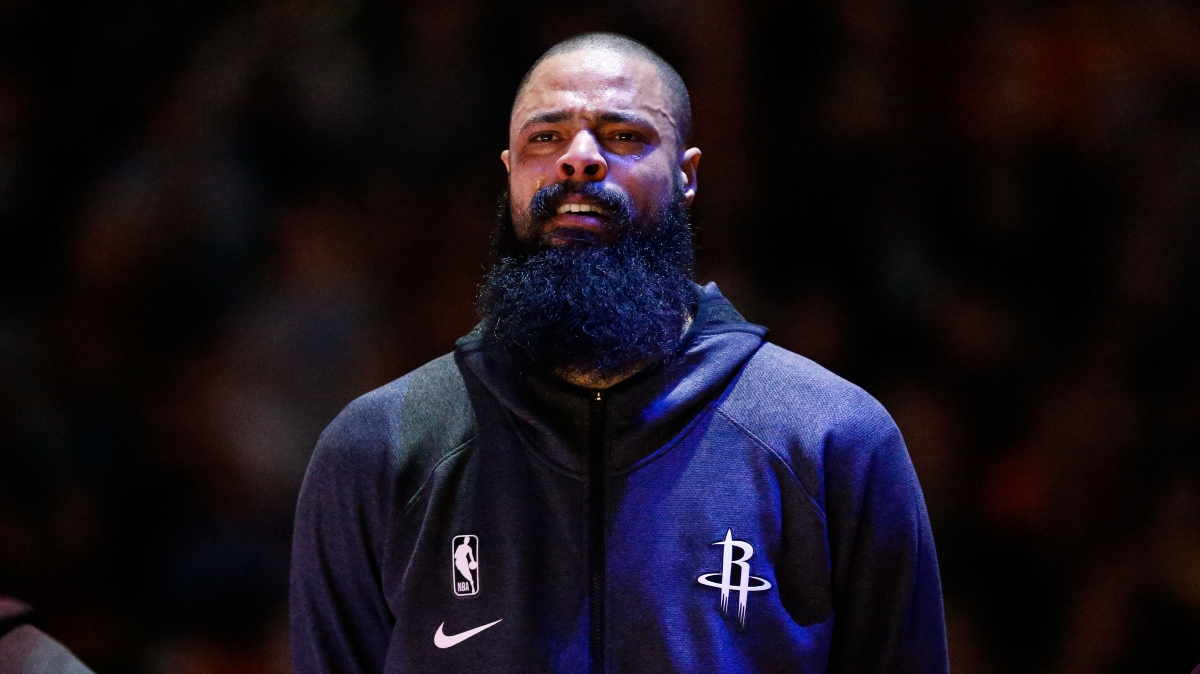 Tears stream down the face off Houston Rockets center Tyson Chandler (19) before the game against the Denver Nuggets at the Pepsi Center.