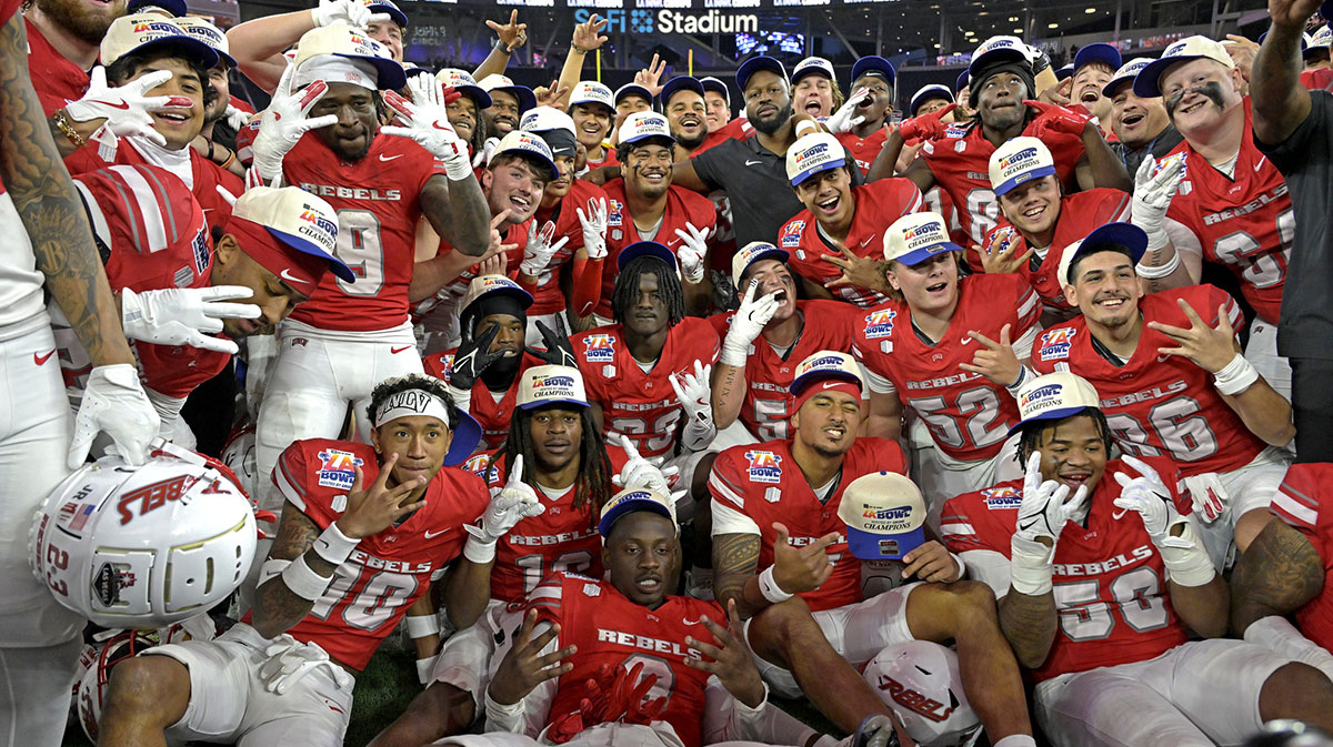 The UNLV Rebels celebrate after defeating the California Golden Bears in the LA Bowl at SoFi Stadium.