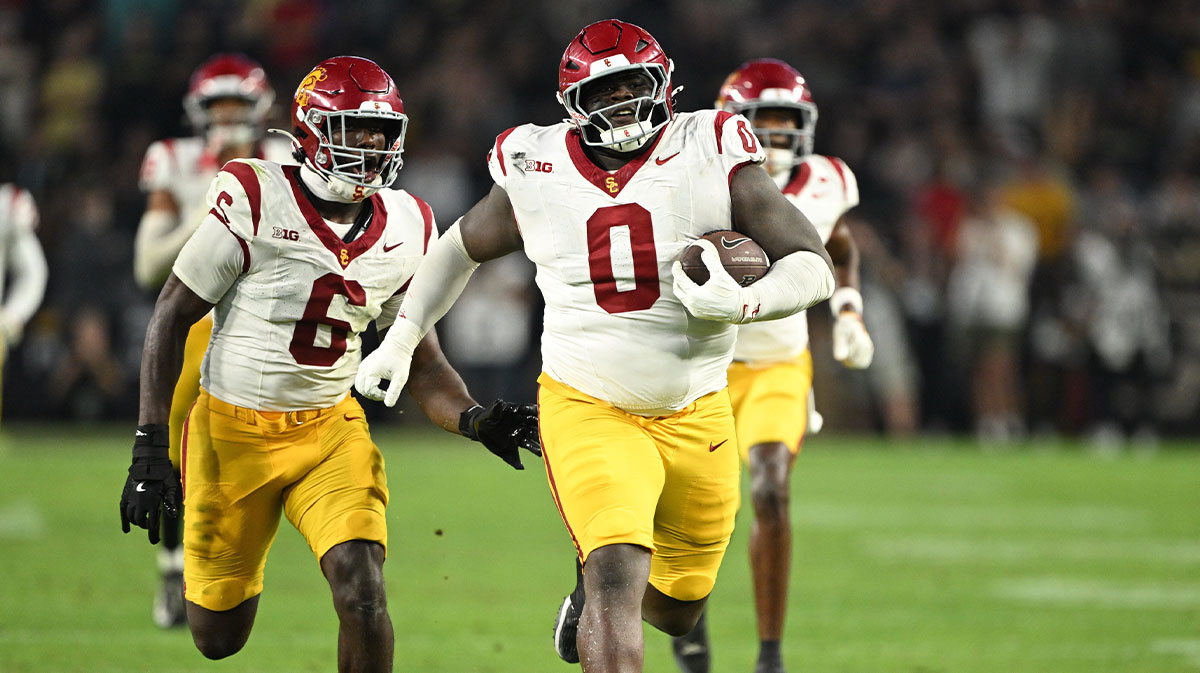 USC Trojans defensive tackle Jamaal Jarrett (0) runs the ball in for a touchdown after intercepting it during the second half against the Purdue Boilermakers at Ross-Ade Stadium.