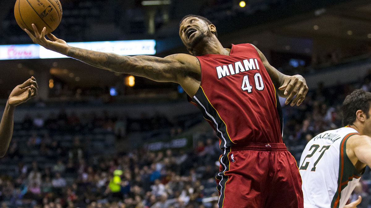 Miami Heat forward Udonis Haslem (40) reaches for a rebound during the third quarter against the Milwaukee Bucks at BMO Harris Bradley Center.