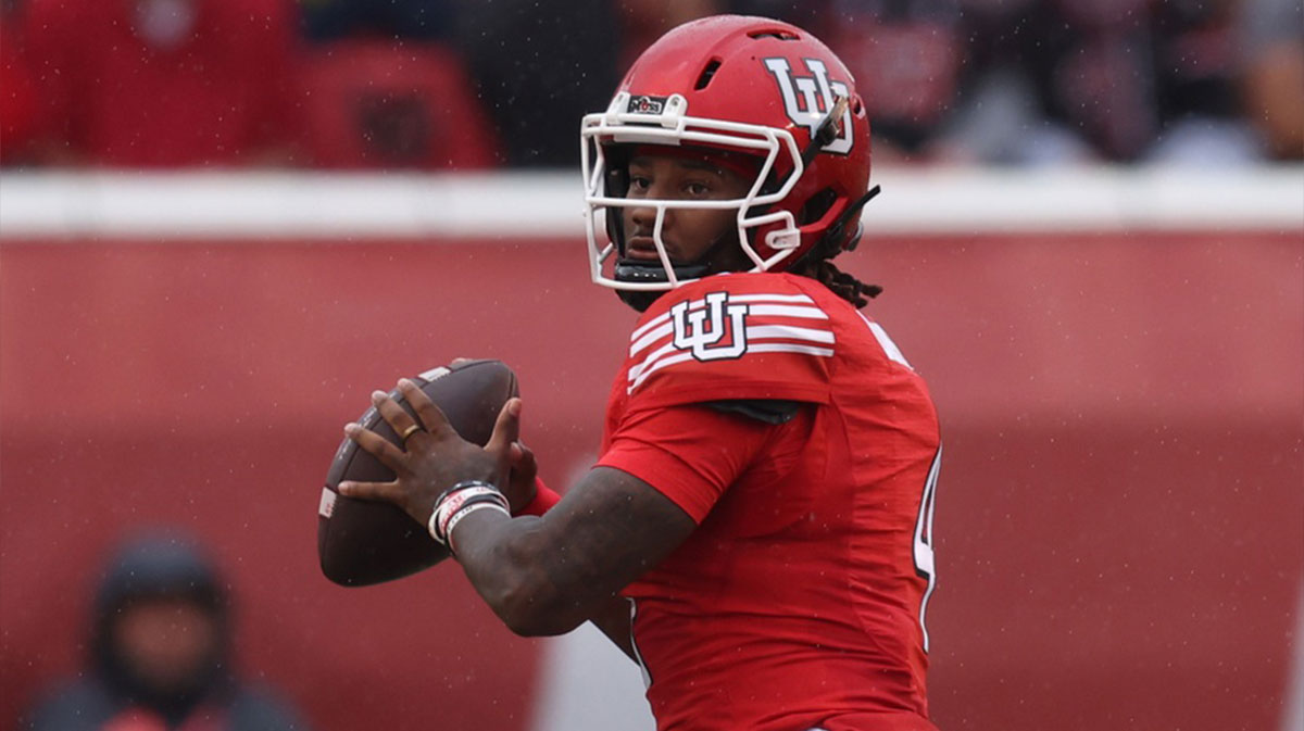 Utah Utes quarterback Devon Dampier (4) looks to pass against the Cal Poly Mustangs during the first quarter at Rice-Eccles Stadium.