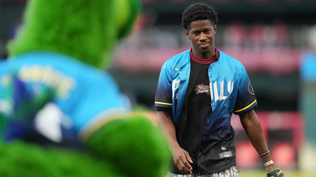 Philadelphia 76ers draft pick V.J. Edgecombe looks on after performing a ceremonial pitch before the game between the Philadelphia Phillies and the Atlanta Braves at Citizens Bank Park.