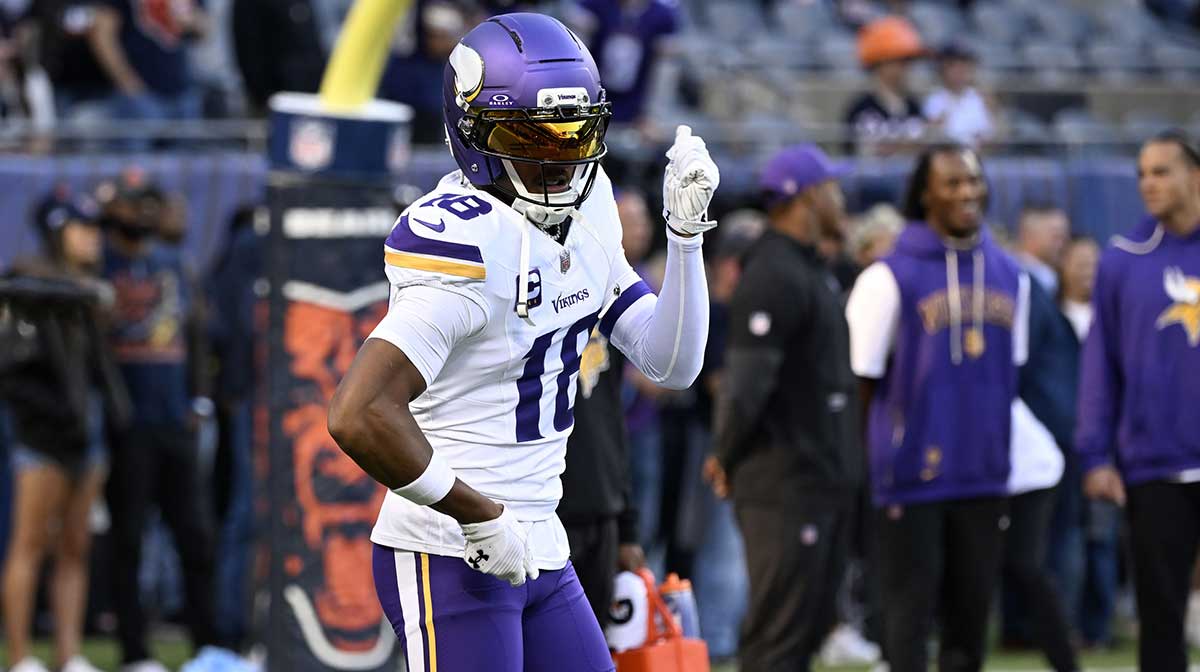 Minnesota Vikings wide receiver Justin Jefferson (18) practices before the game at Soldier Field.