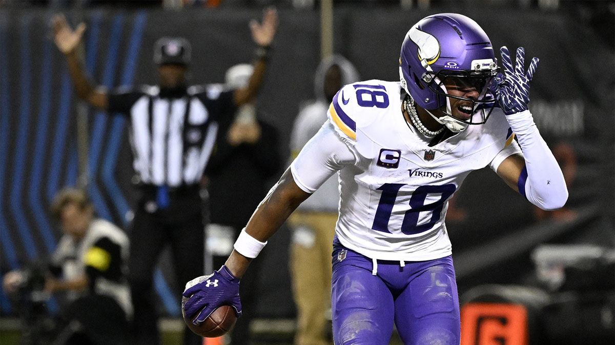 Minnesota Vikings wide receiver Justin Jefferson (18) reacts after scoring a touchdown against the Chicago Bears during the second half at Soldier Field.