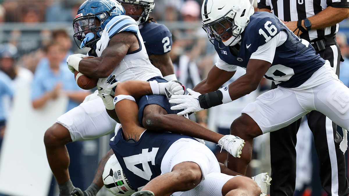 Villanova Wildcats running back Ja'briel Mace (4) pushes forward with the ball during the first quarter against the Penn State Nittany Lions at Beaver Stadium.