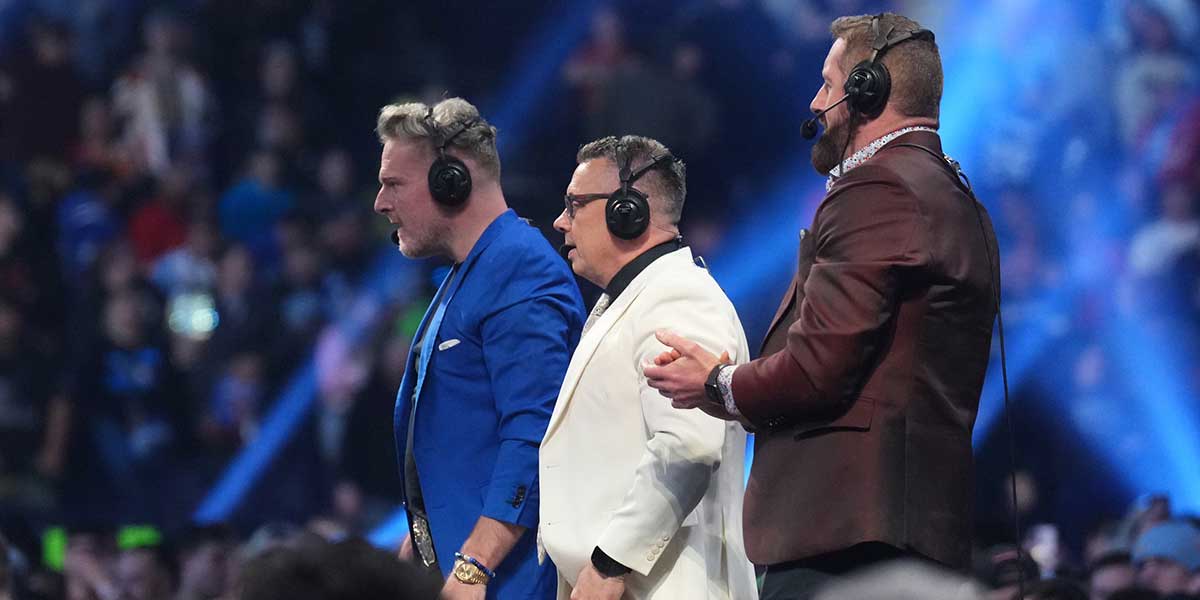 Pat McAfee and Michael Cole and Wade Barrett during the WWE Royal Rumble at Lucas Oil Stadium.