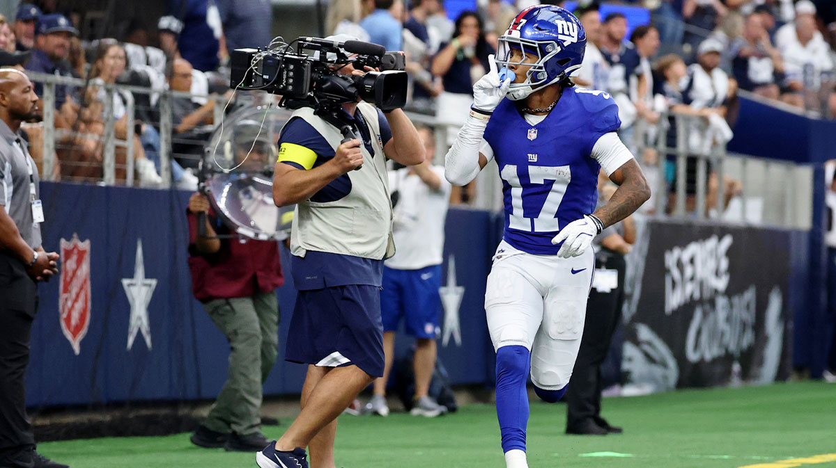 New York Giants wide receiver Wan'Dale Robinson (17) reacts after making a catch for a touchdown against the New York Giants during the fourth quarter at AT&T Stadium.