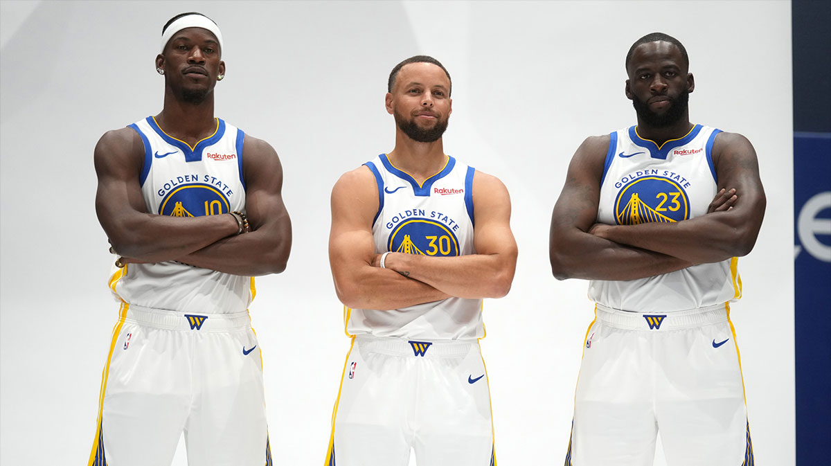 Golden State Warriors guard Stephen Curry (30), forward Draymond Green (23), and forward Jimmy Butler III (10) pose for a photo during Media Day at the Chase Center.