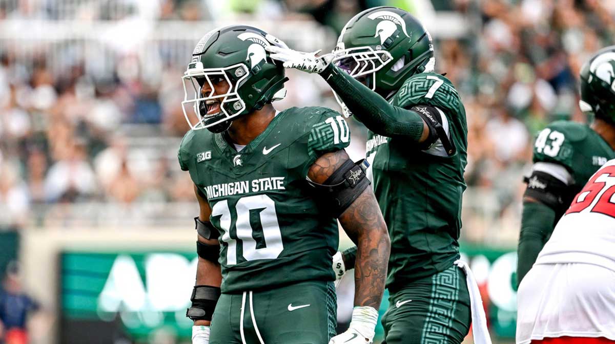Michigan State's Wayne Matthews III, left, celebrates with Nikai Martinez after a tackle against Youngstown State during the third quarter on Saturday, Sept. 13, 2025, at Spartan Stadium in East Lansing.