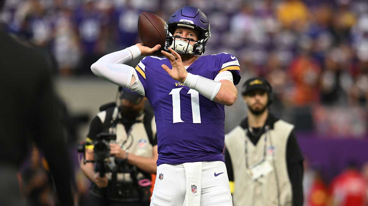Minnesota Vikings quarterback Carson Wentz (11) warms up prior to a game against the Cincinnati Bengals at U.S. Bank Stadium.