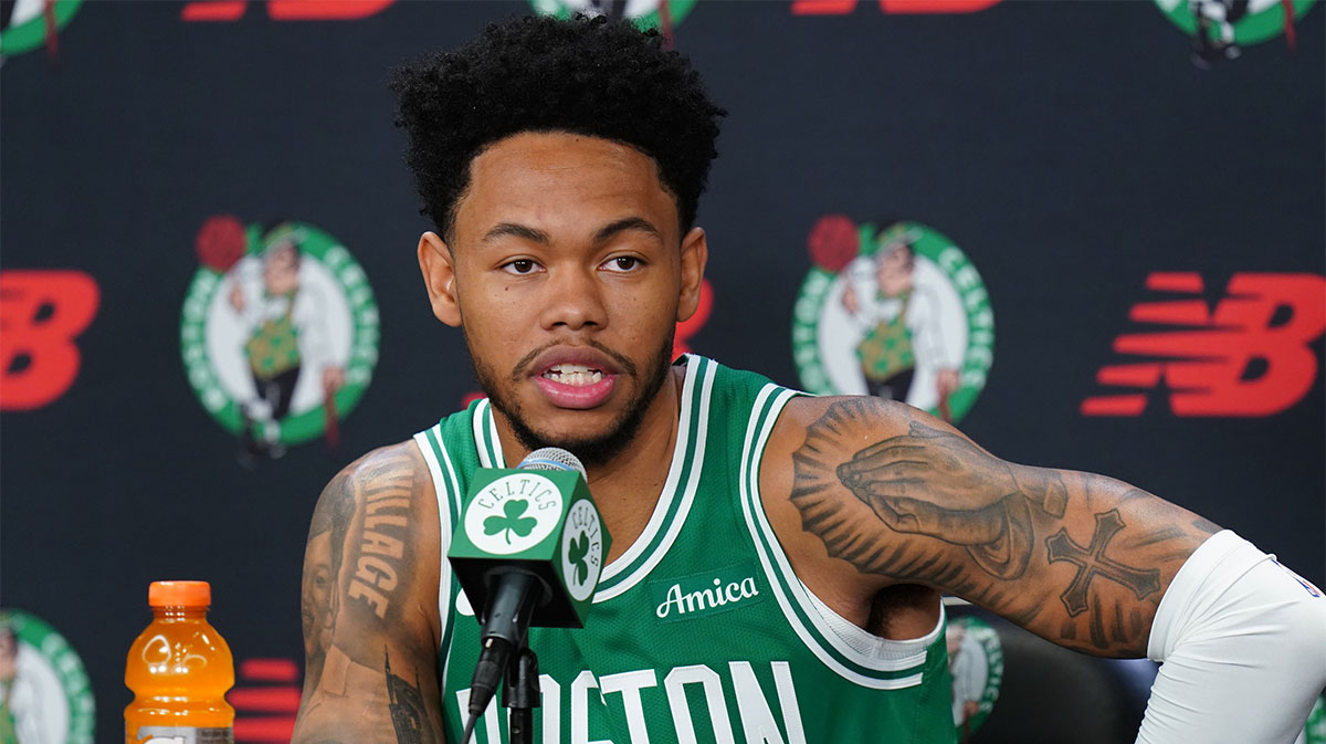 Boston Celtics guard Anfernee Simons (4) talks with reporters during media day at the Auerbach Center.
