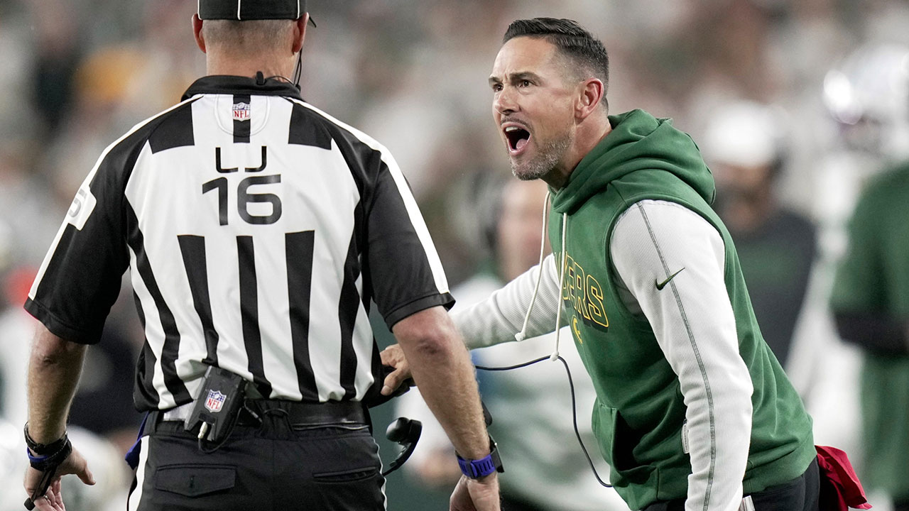 Green Bay Packers head coach Matt LaFleur argues for a penalty with down judge Kevin Codey (16) during the first quarter of their game against the Washington Commanders Thursday, September 11, 2025 at Lambeau Field in Green Bay, Wisconsin.