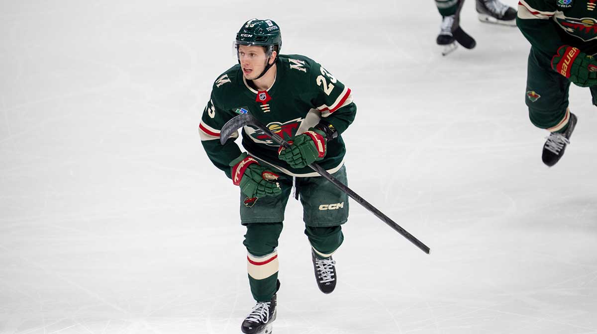 Minnesota Wild center Marco Rossi (23) leads the team to the bench after scoring against the Vegas Golden Knights in the first period in game three of the first round of the 2025 Stanley Cup Playoffs at Xcel Energy Center.