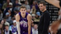 Utah Jazz forward Lauri Markkanen (23) and head coach Will Hardy talk during a stop in play in the second half against the Orlando Magic at Delta Center.