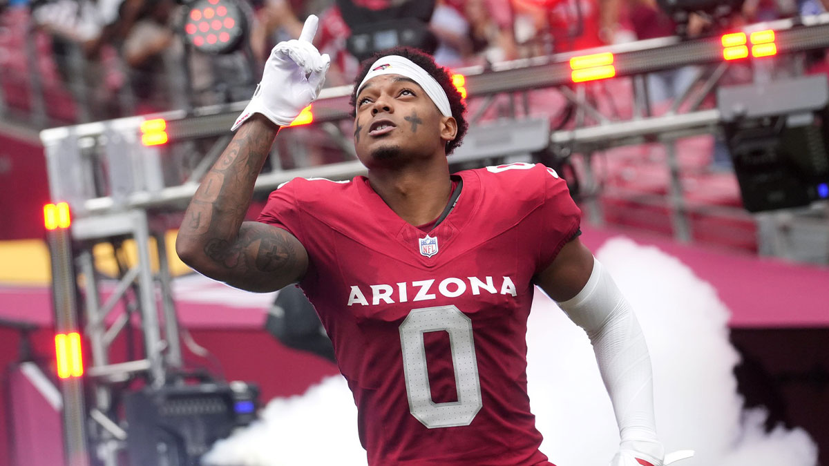 Arizona Cardinals cornerback Will Johnson (0) is introduced before their game against the Carolina Panthers at State Farm Stadium.