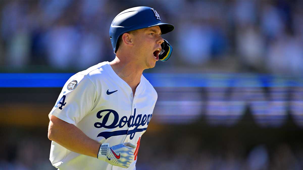 Los Angeles Dodgers catcher Will Smith (16) celebrates as he rounds the bases on a walk-off home run in the ninth inning against the Arizona Diamondbacks at Dodger Stadium.