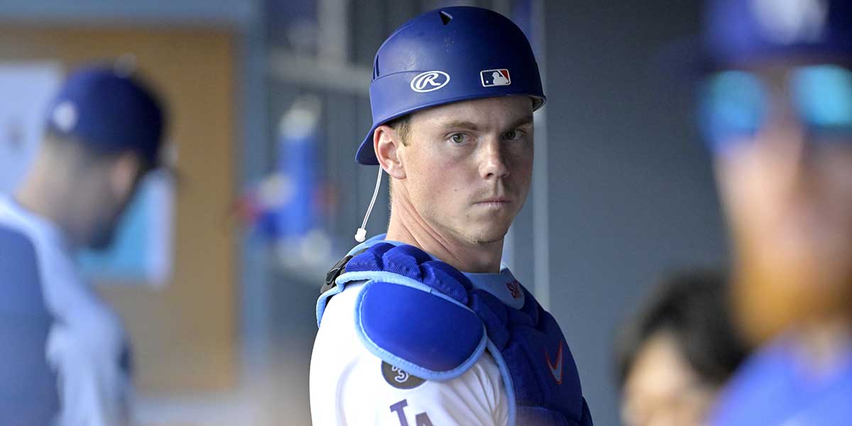 Los Angeles, California, USA; Los Angeles Dodgers catcher Will Smith (16) gets ready in the dugout for the game against the San Diego Padres at Dodger Stadium.