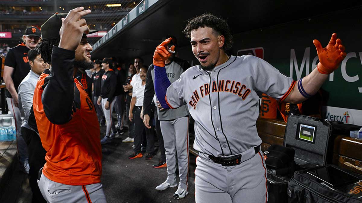 San Francisco Giants shortstop Willy Adames (2) celebrates with Luis Matos (29) after hitting a solo home run against the St. Louis Cardinals during the first inning at Busch Stadium.