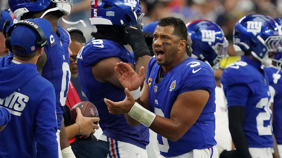 New York Giants quarterback Russell Wilson (3) claps after a play against the Dallas Cowboys during the fourth quarter at AT&T Stadium.