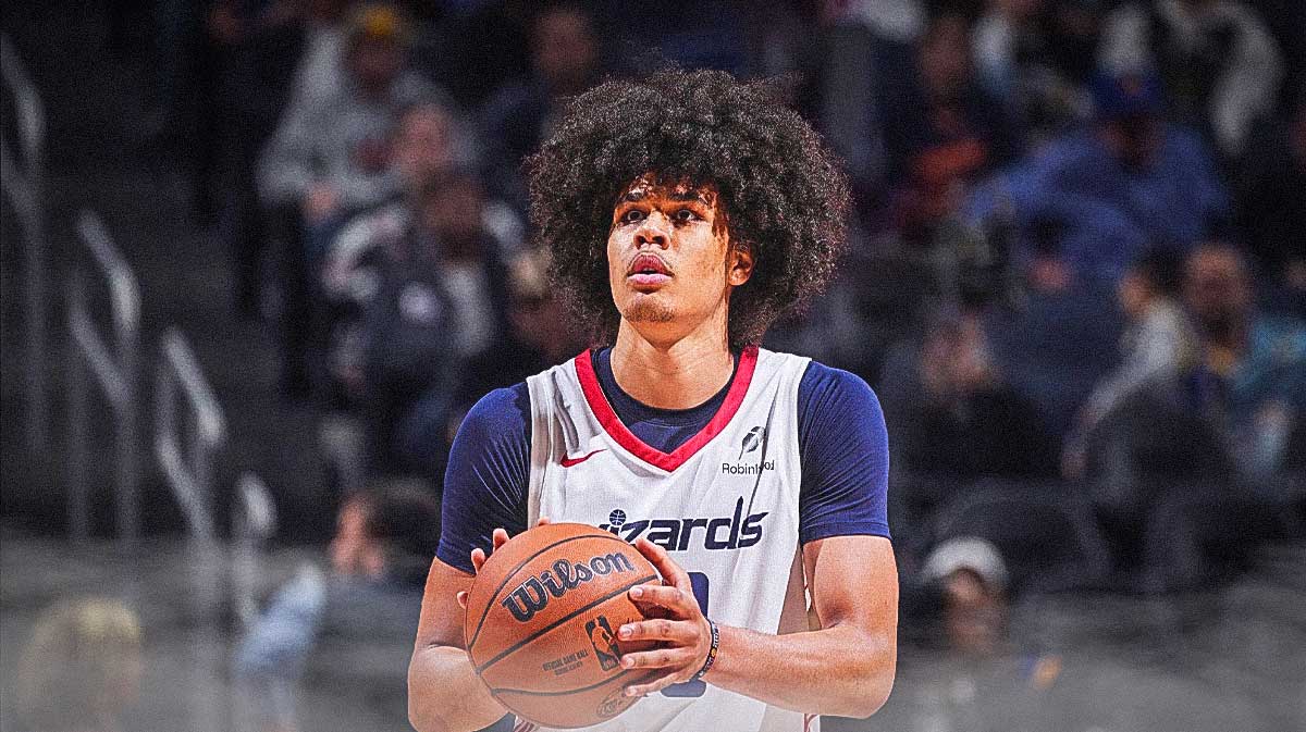 Kyshawn George in the Wizrds jersey with basketball in his hands. Wizards player who will shock world with breakout 2025-26 season