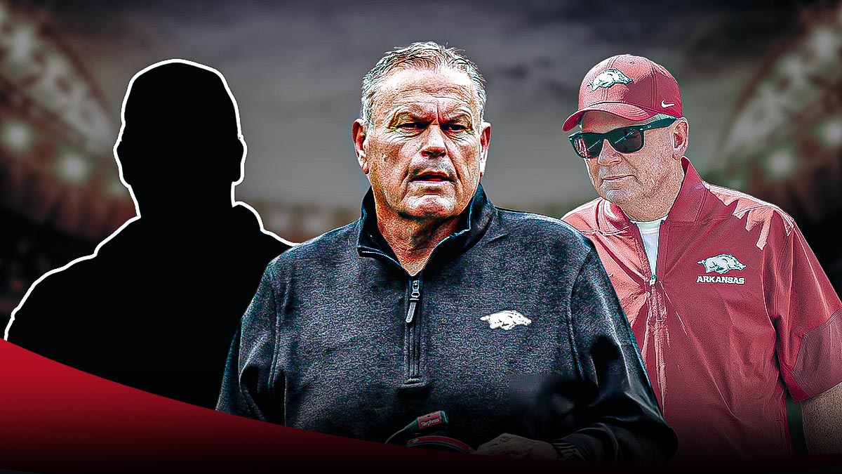 Sam Pittman in the middle, Bobby Petrino on one side and a mystery coach on the other. Arkansas logo in the background.