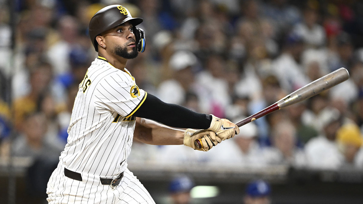 San Diego Padres shortstop Xander Bogaerts (2) hits an RBI double during the eighth inning against the Los Angeles Dodgers at Petco Park.