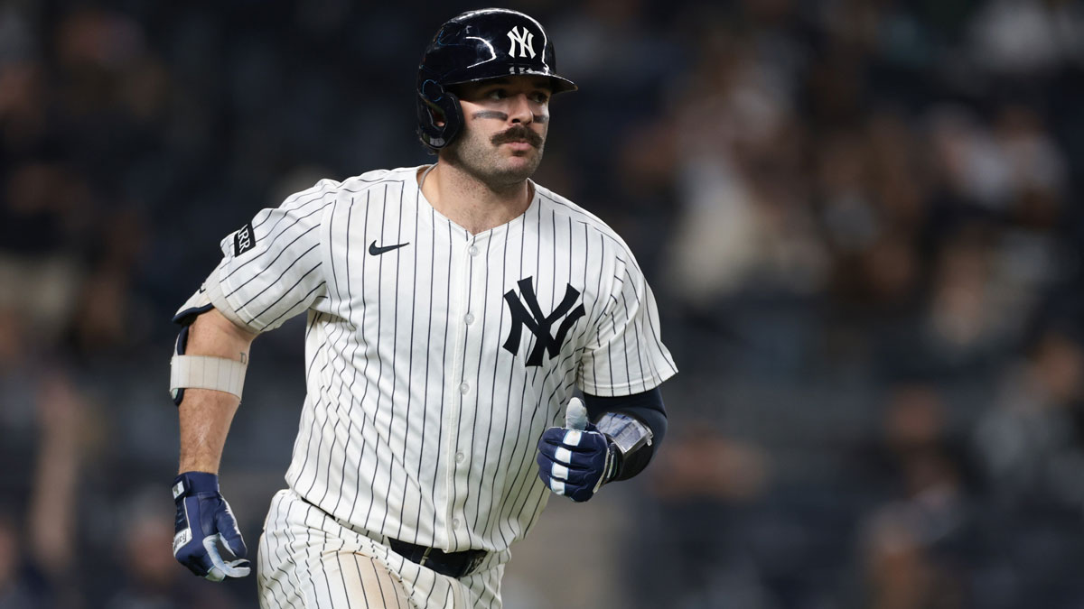 New York Yankees catcher Austin Wells (28) hits a solo home run during the eighth inning against the Detroit Tigers at Yankee Stadium.