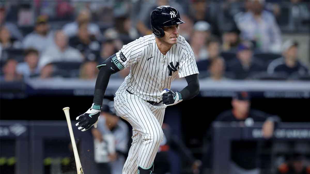 New York Yankees center fielder Cody Bellinger (35) follows through on an RBI single against the Detroit Tigers during the fourth inning at Yankee Stadium.